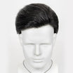 Black wig on a mannequin head against a white background