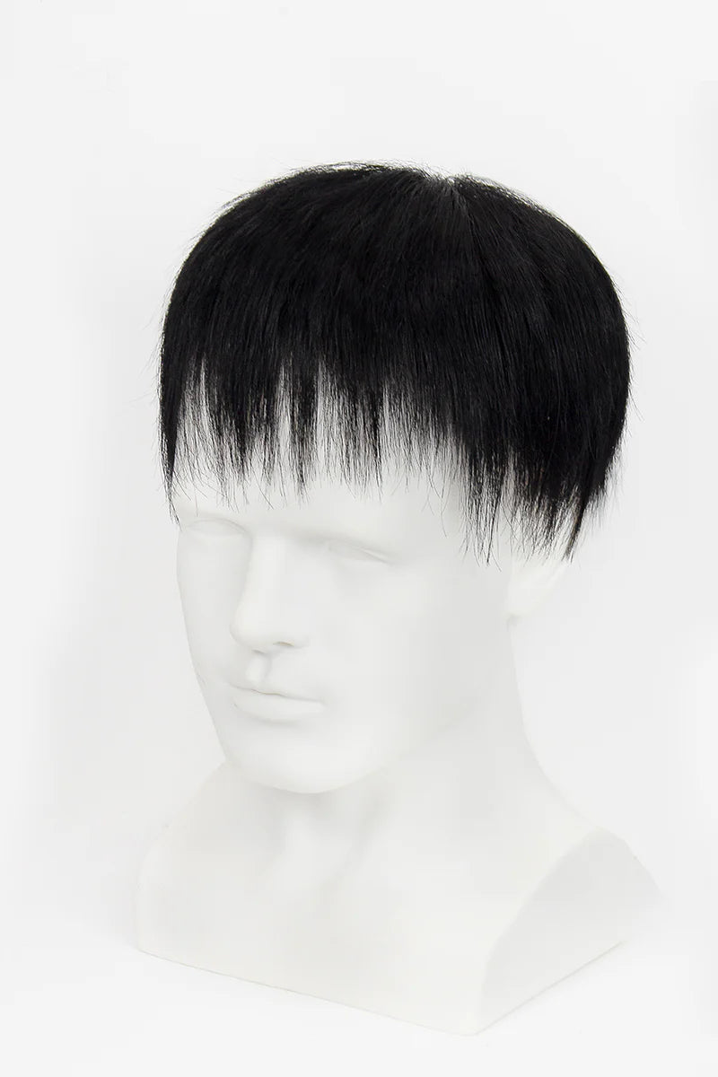 Man with styled hair and beard wearing a black turtleneck against a white background