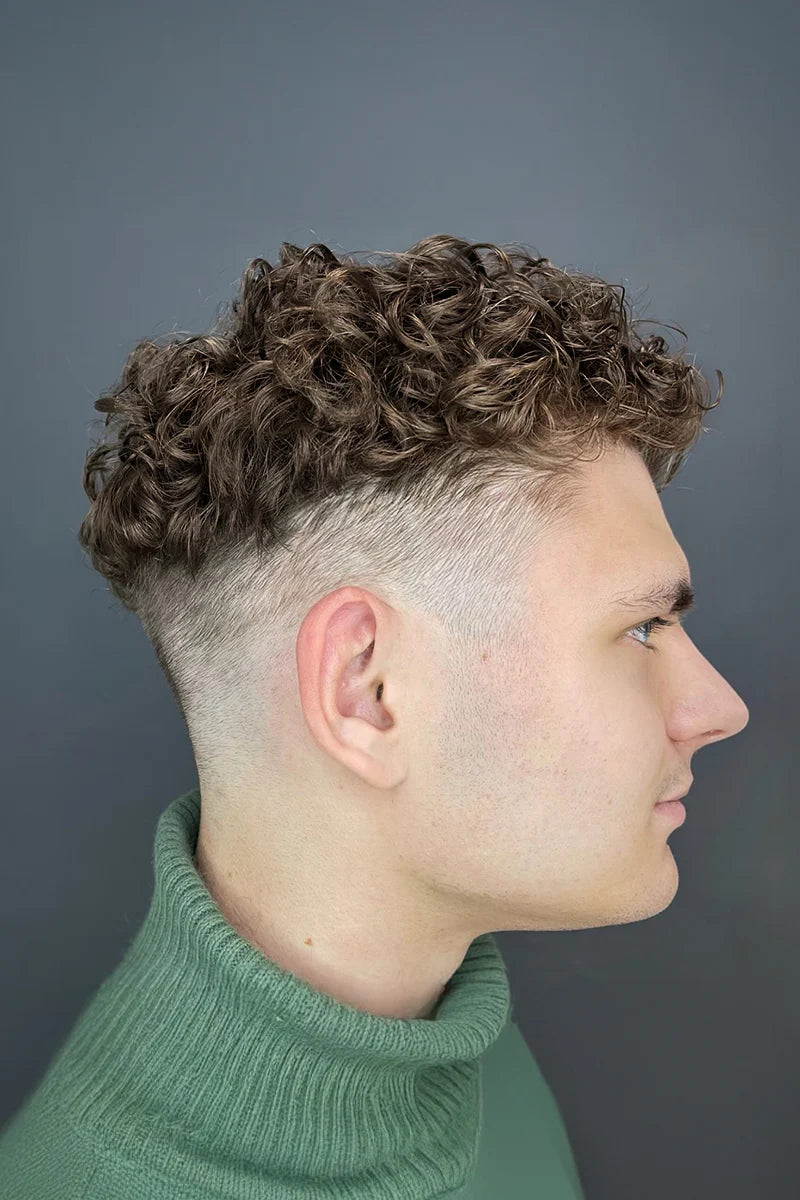 Mannequin head with a black wig on a white background