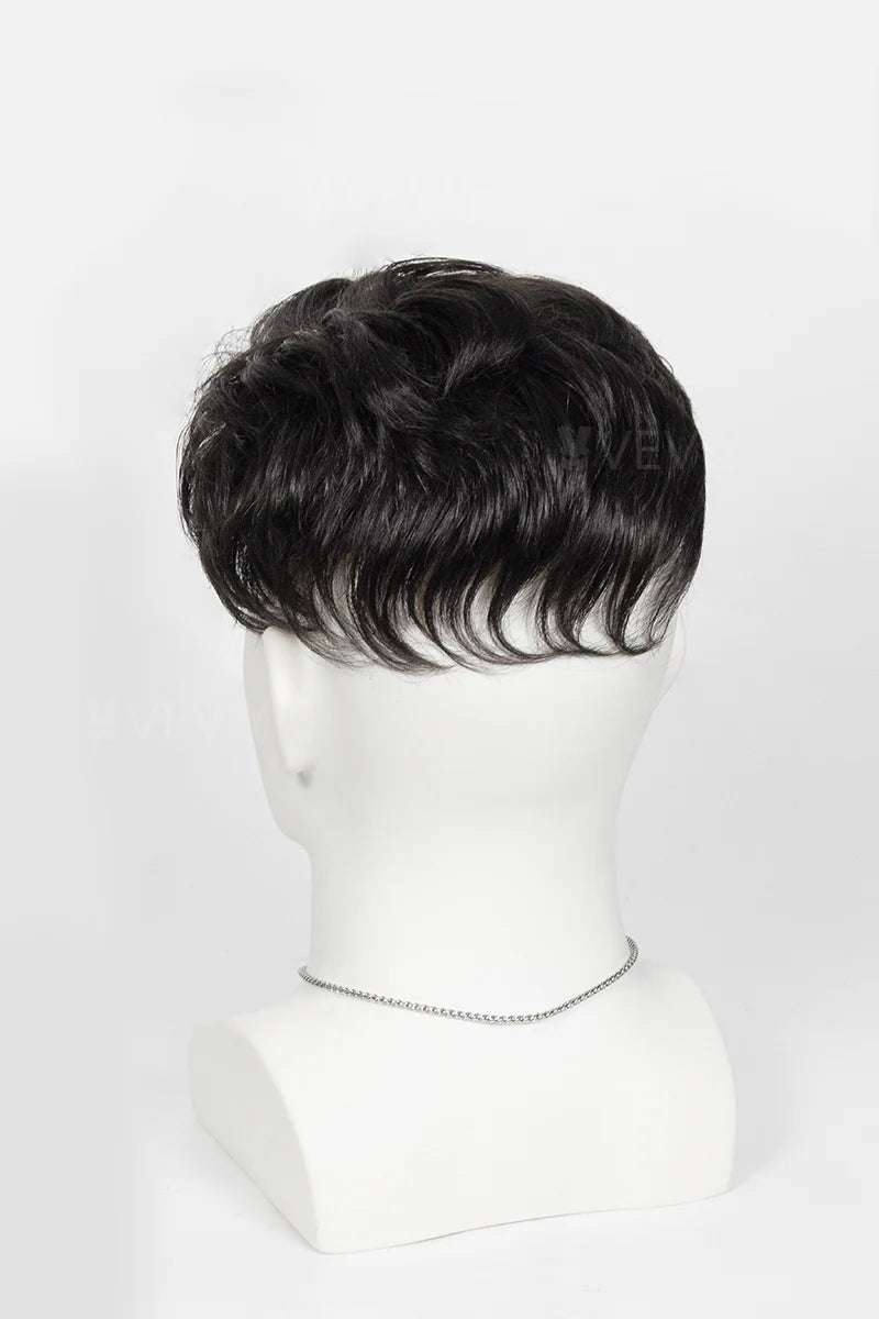 Corey topper on a mannequin head against a white background