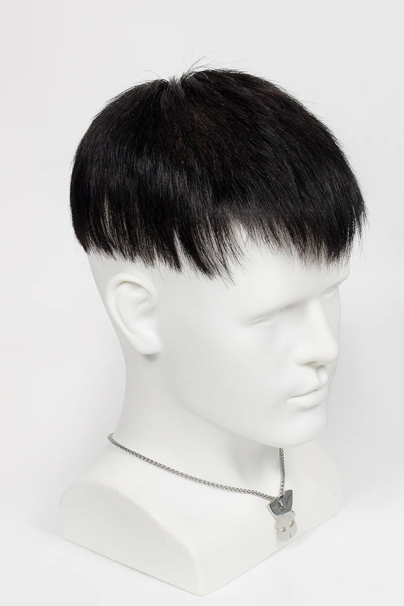 Mannequin head with a black wig on a white background