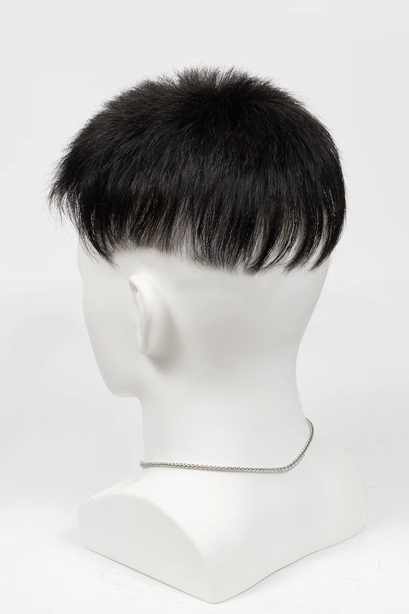 Mannequin head with a black wig on a white background