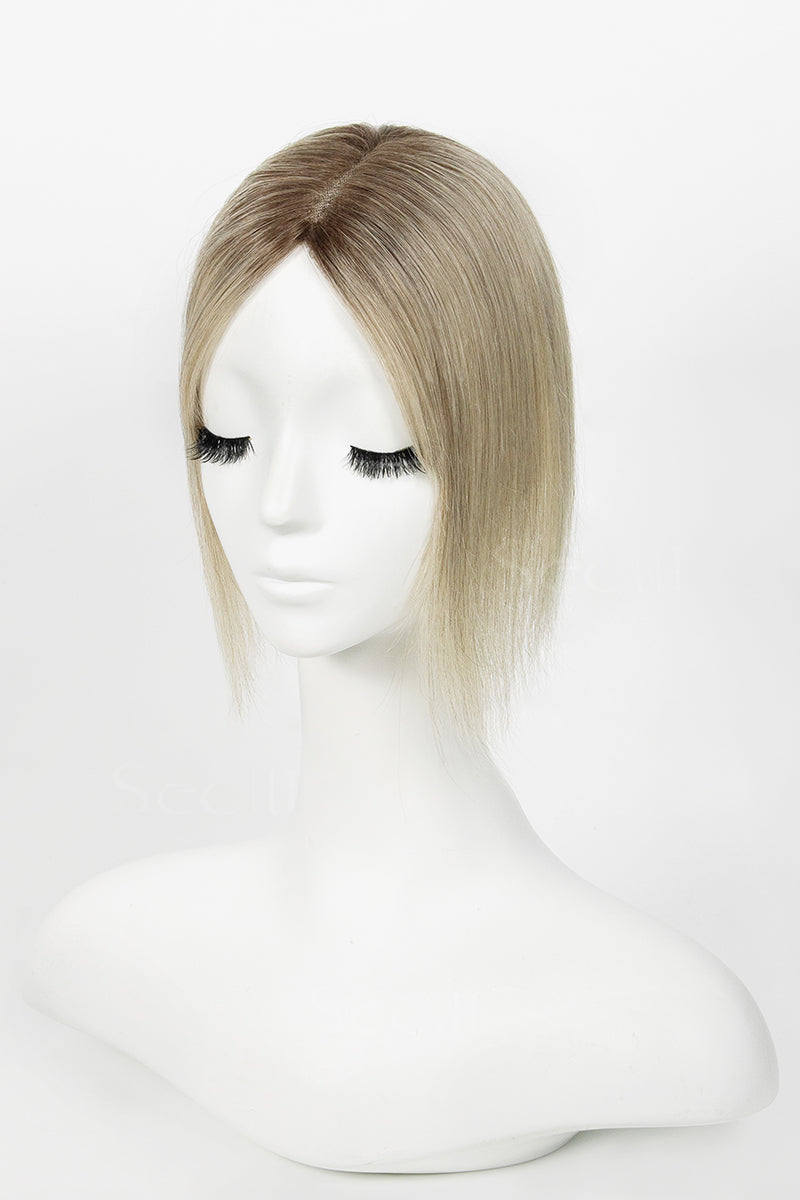Mannequin head with a Mona Handmade Human Hair Topper Ombre Dark Root to Blonde #T2/M616 on a white background